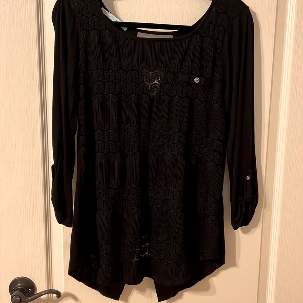 Oversized black blouse.